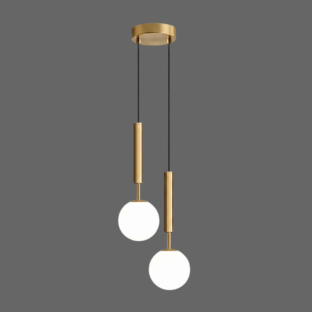 Gold two-head cylindrical pendant light with two round white globe glass shades
