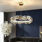 Gold-tone petal disc chandelier with circular ribbed tier and layered glass disc shades