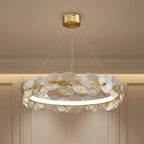 Gold canopy hanging chandelier with circular petal-disc ring and ribbed tiered light