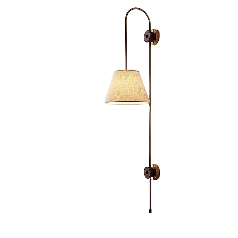 Swan-neck wall light with tapered fabric shade and curved brass arms