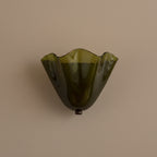 Green scalloped wave glass wall light with dark mounting base
