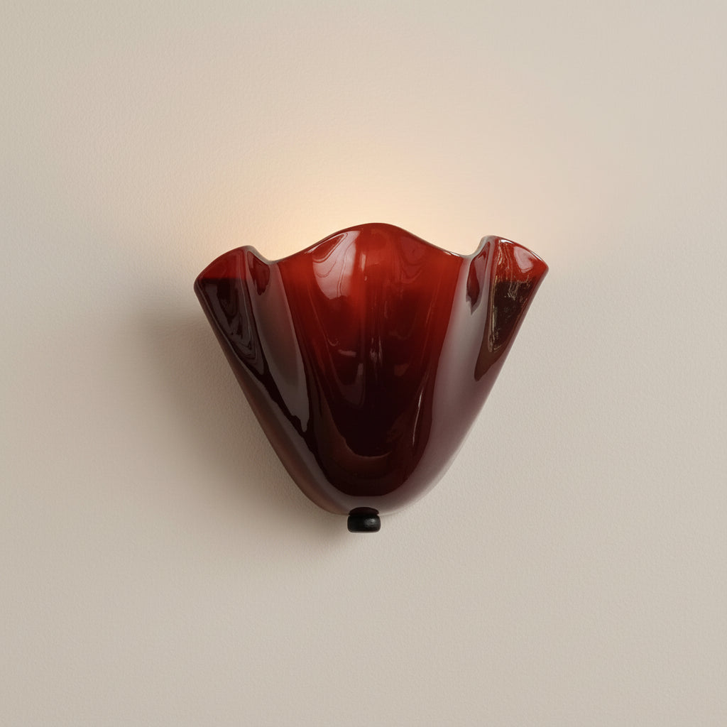 Red scalloped wave glass wall light with dark mounting base