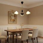 Angled cone chandelier with black canopy, gold arms, and three white cone shades