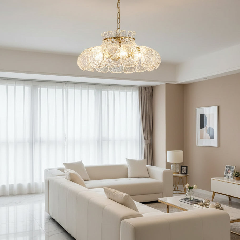Ripple-textured glass petal chandelier shade with scalloped rim, warm light glow.