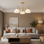 Nordic 3-light branch chandelier with ribbed white glass shades and gold arms