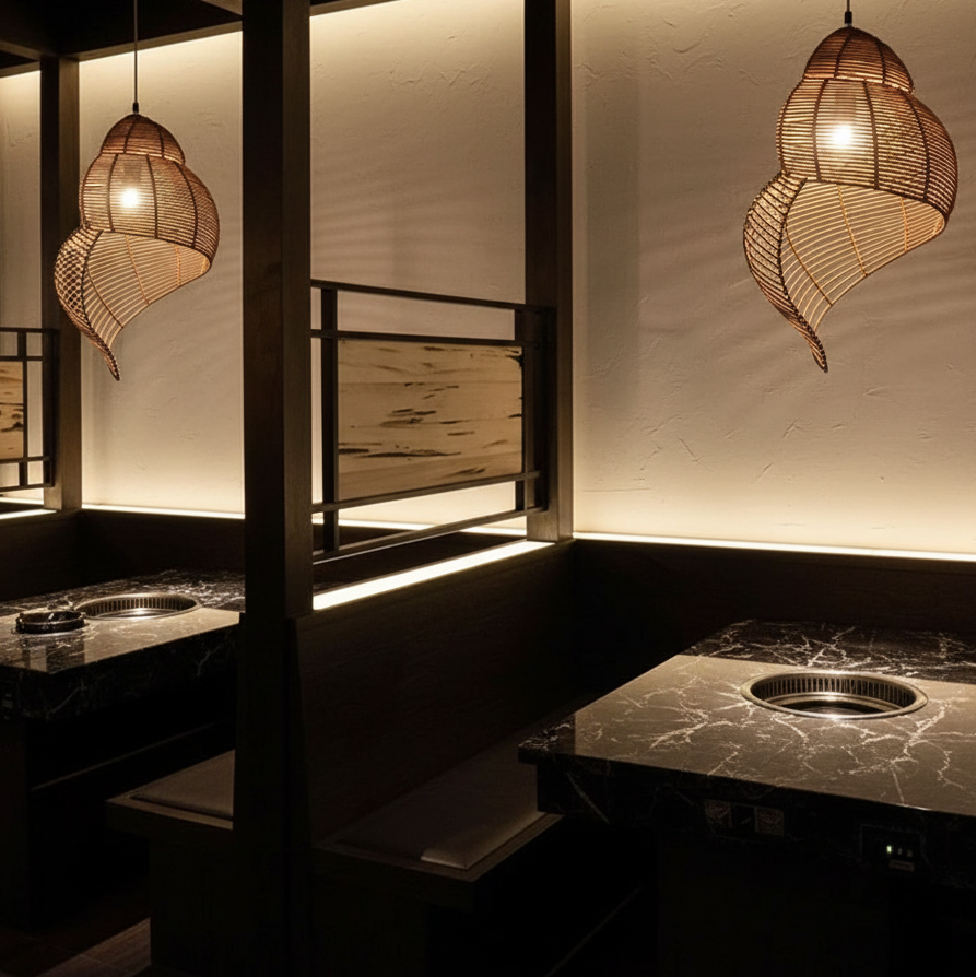 Handmade rattan heart pendant lights, three warm-glowing shades with exposed cords