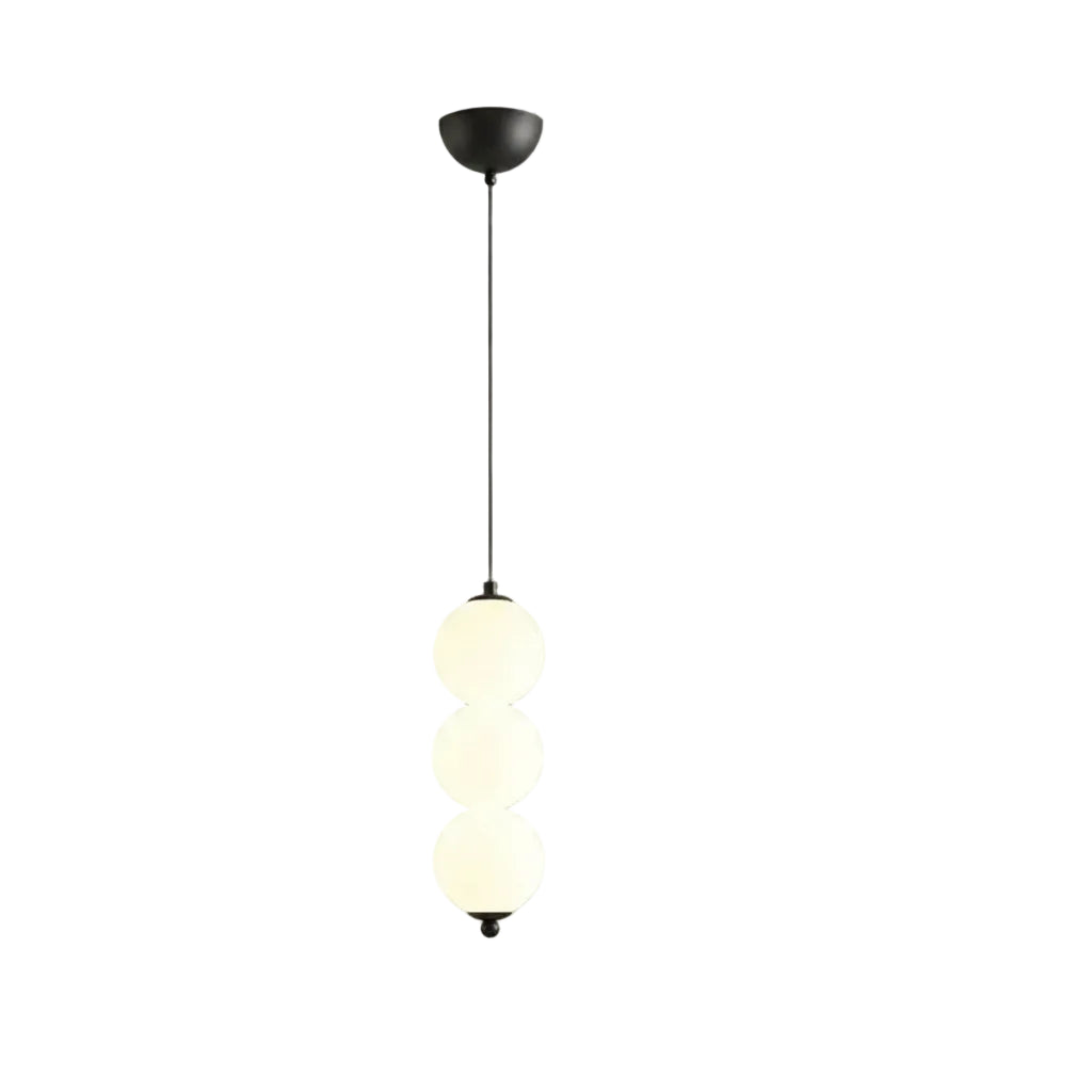 Stacked globe pendant light with black canopy and three opal glass shades