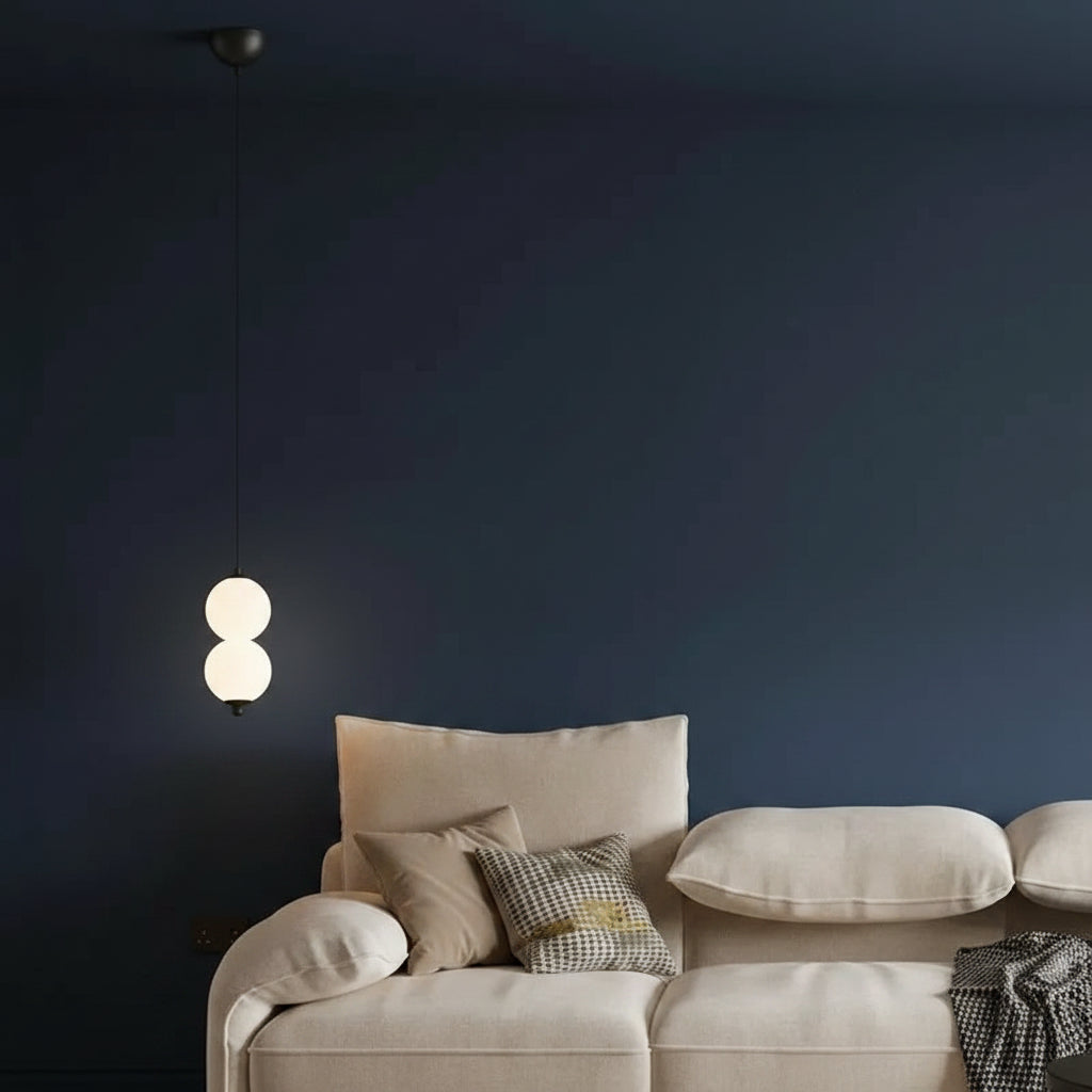 Stacked globe pendant light with two opal glass shades, black cord
