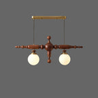 Walnut linear spindle-ball chandelier with 2 frosted glass globe lights