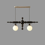 Black linear spindle-ball chandelier with 2 frosted glass globe lights