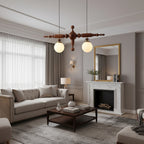 Walnut linear spindle-ball chandelier with 3 frosted glass globe lights