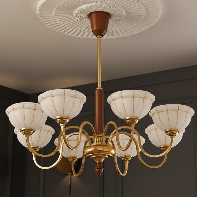 Gold 8-light chandelier with curved arms, off-white glass shades, ribbed petal canopy
