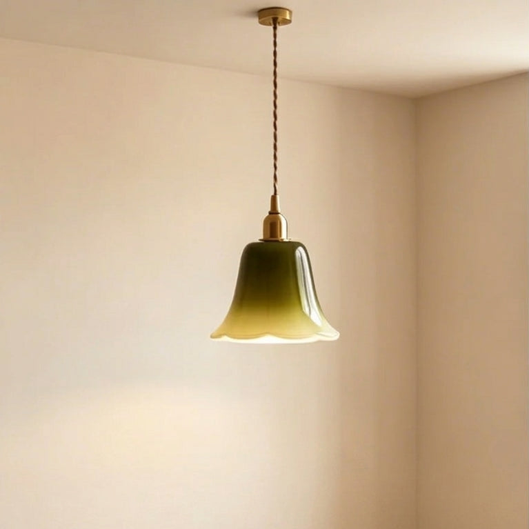 Green opaline bell-shade pendant light with twisted cord and brass ceiling mount