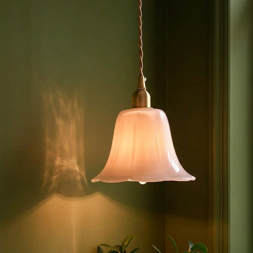 Pink opaline bell-shade pendant light with twisted cord and brass cap