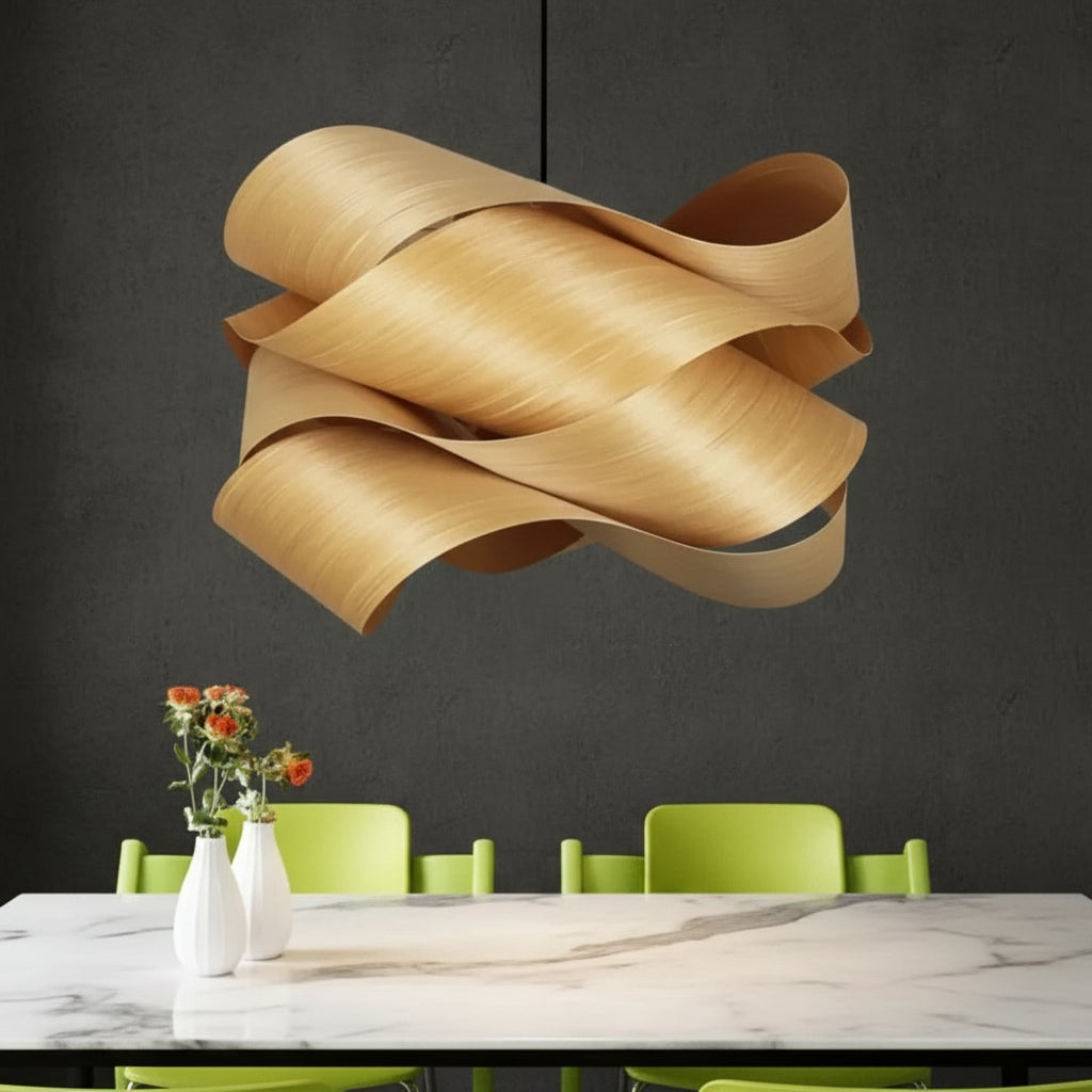 Light wood ribbon pendant lamp with overlapping curved shades and black hanging cord.