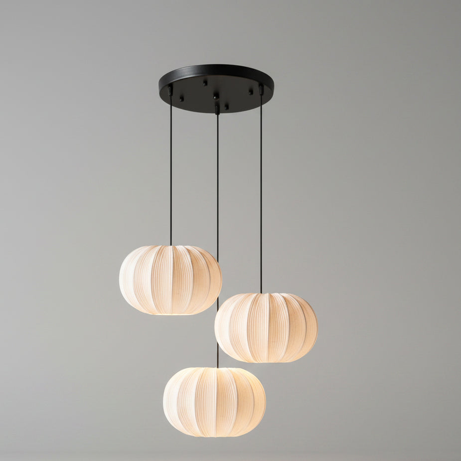 Three-head fabric pumpkin pendant light with black canopy and cream pleated shades