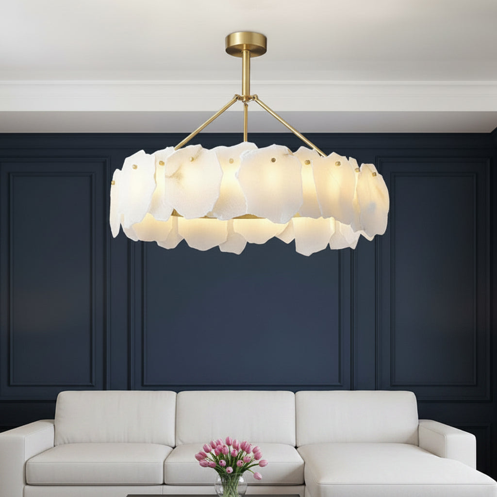 Brass and white tiered drum disc hanging chandelier with sculpted glass shades