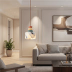 Stacked pebble pendant light with marble-style shade and terracotta, cream, and green beads