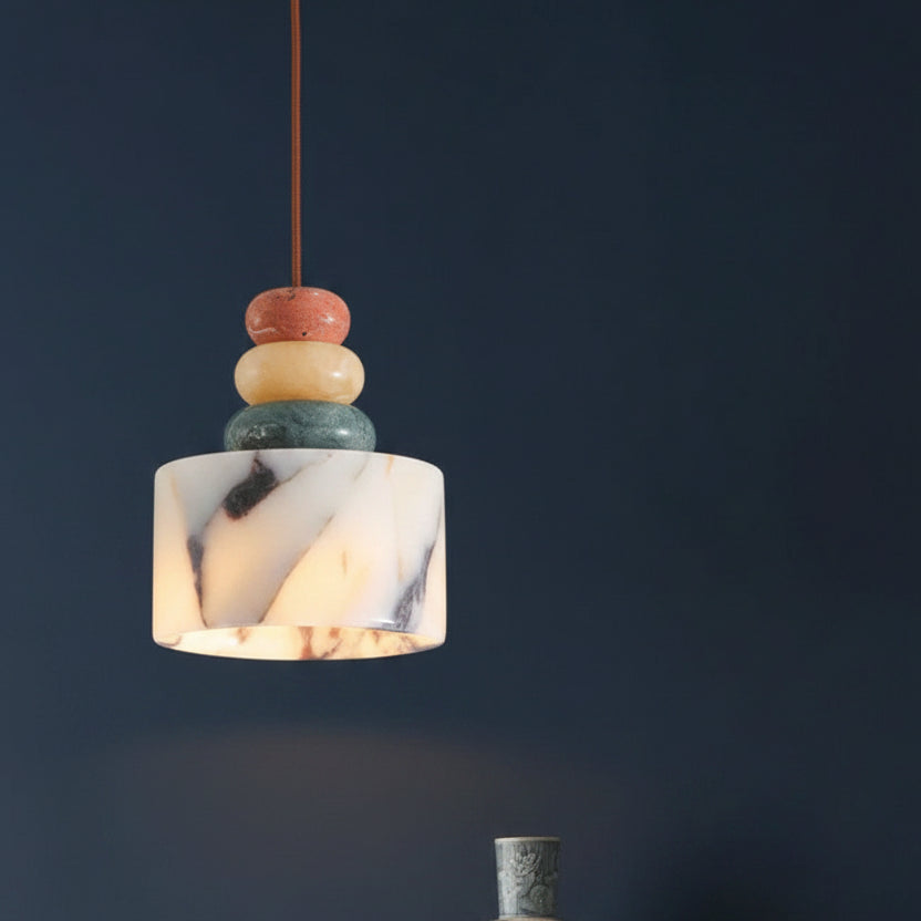 Marble-style pendant light with terracotta, cream, and green stacked beads