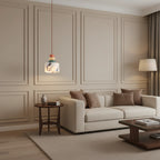 Stacked pebble pendant light with frosted marble-look shade and terracotta bead accents