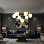 Multi-globe frosted glass chandelier with circular wooden frame and hanging spherical shades