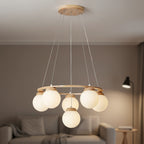 Hanging frosted glass globe chandelier with round wooden frame and multiple spherical light shades