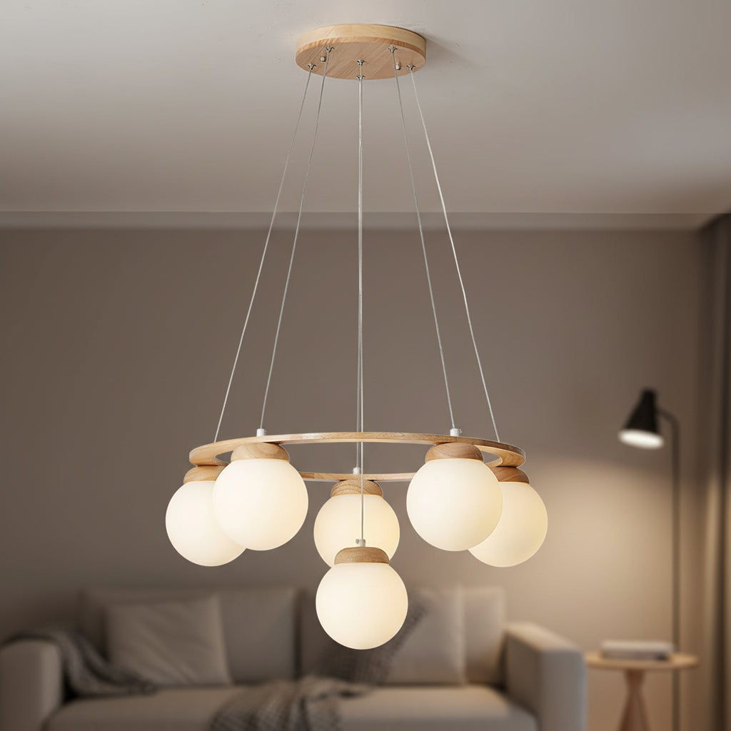 Hanging frosted glass globe chandelier with round wooden frame and multiple spherical light shades
