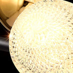 Textured glass globe shade with faceted pattern for chandelier lighting