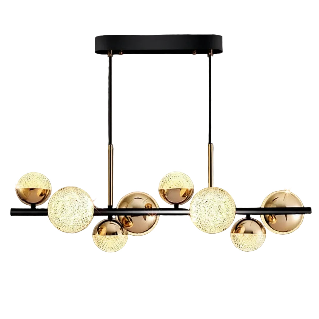 Globe chandelier with textured glass spheres, black canopy, and brass frame