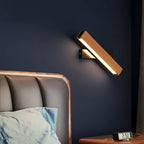 Rotatable arm wooden wall light casting warm white LED glow; angled bracket mount