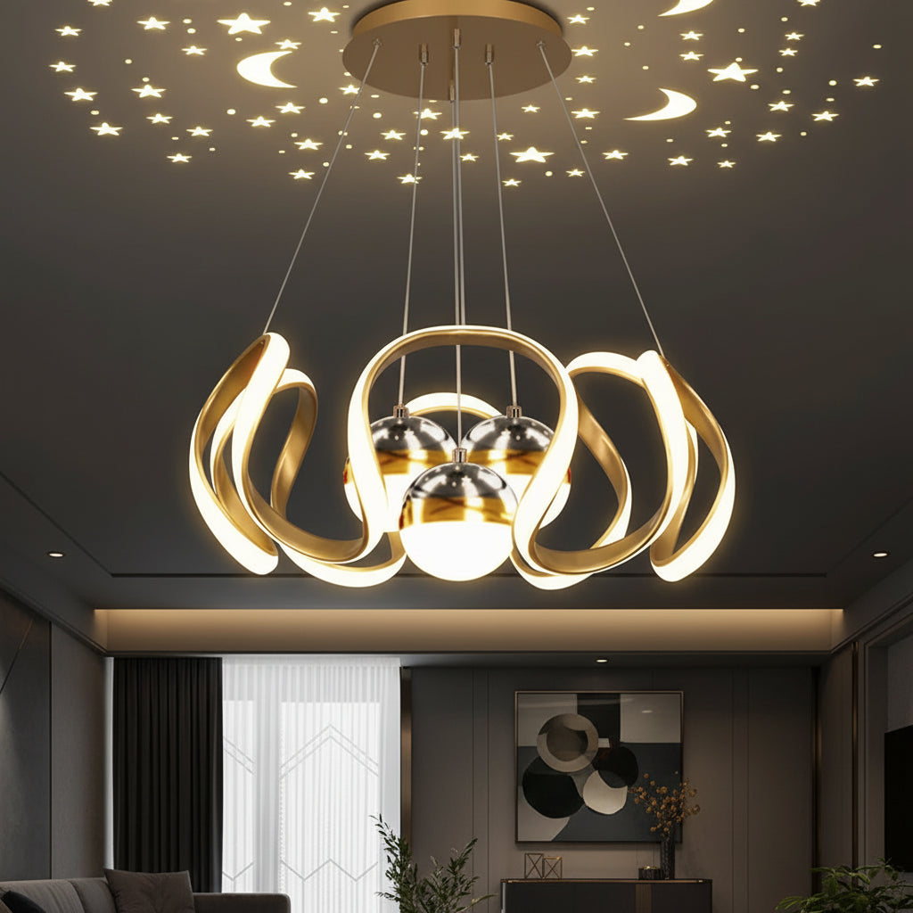 Gold ribbon star chandelier with circular metal frame and three hanging bulbs