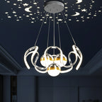 Chrome ribbon star chandelier with round canopy and three hanging bulbs