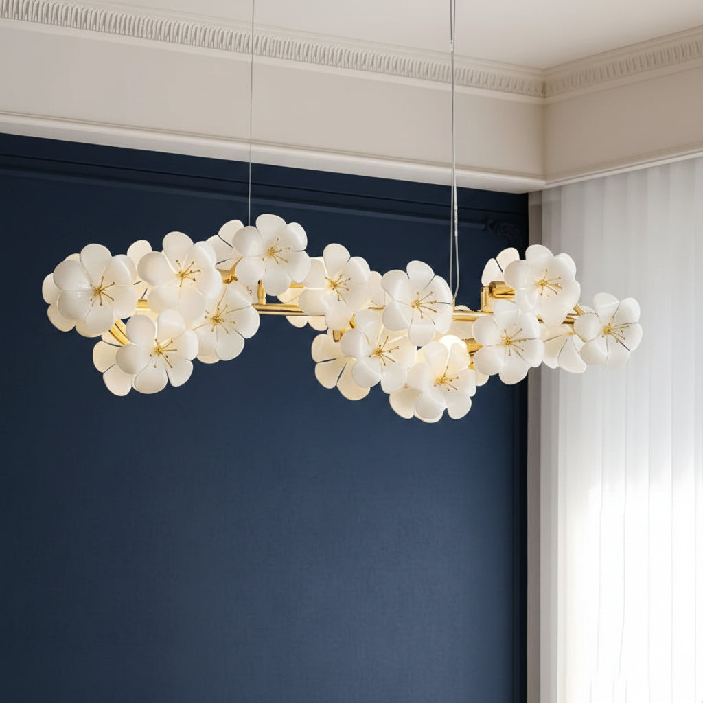 White floral blossom chandelier with gold bar frame and hanging flower clusters