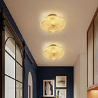 Amber fluted saucer ceiling light, featuring a ribbed glass shade and central round opening