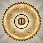 Amber fluted ceiling light close-up with ribbed texture and round recessed center