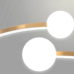 Close-up of two glowing white LED globe lights on a gold ring bar