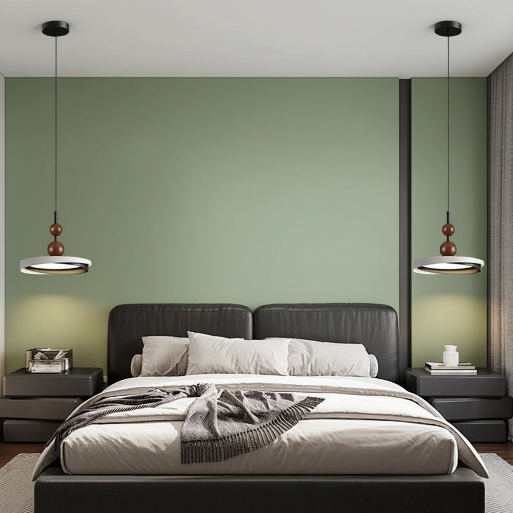 Ring LED pendant light with dark canopy, round disc shade, and wooden bead cord, two shown