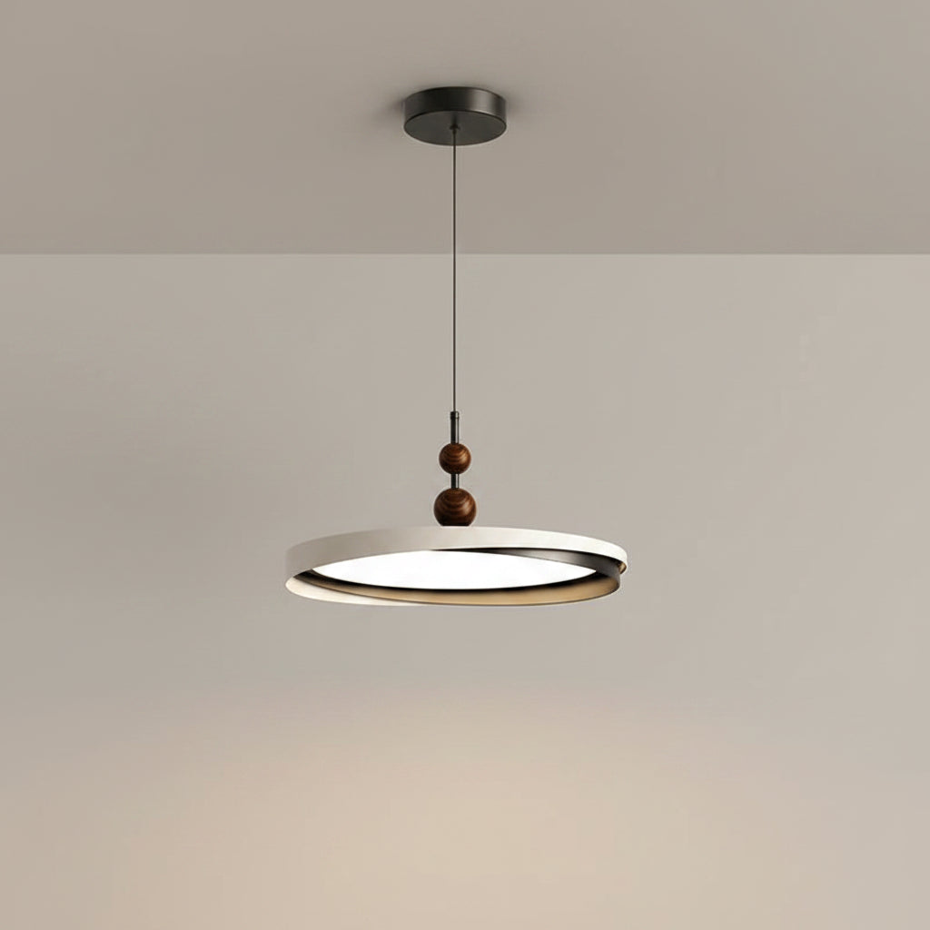 Round ring LED pendant with dark ceiling mount and two wooden bead accents on hanging cord