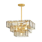 Layered square glass chandelier with gold frame, hanging stem, and warm glowing bulbs