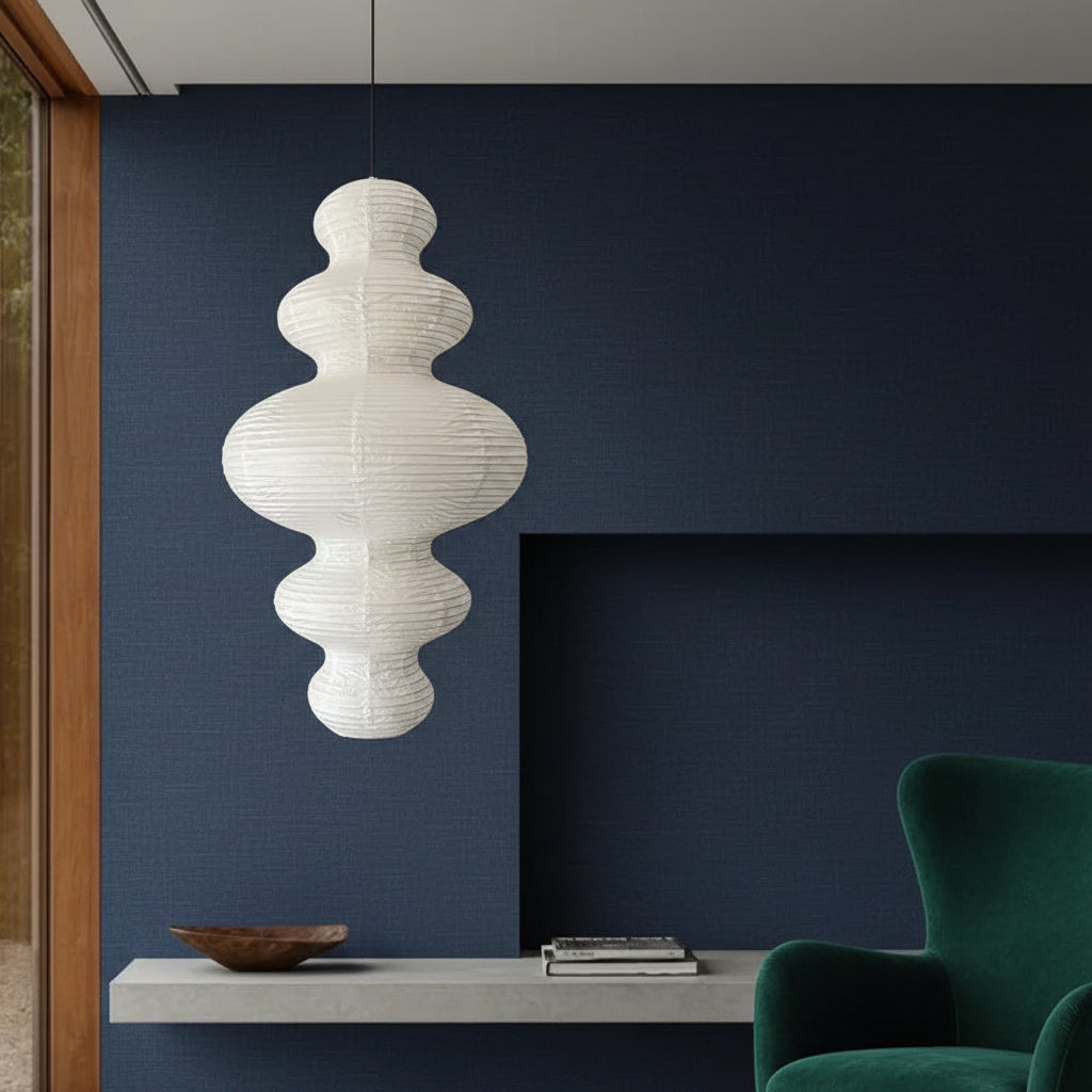 Stacked paper pendant light with layered globe paper shades in light color