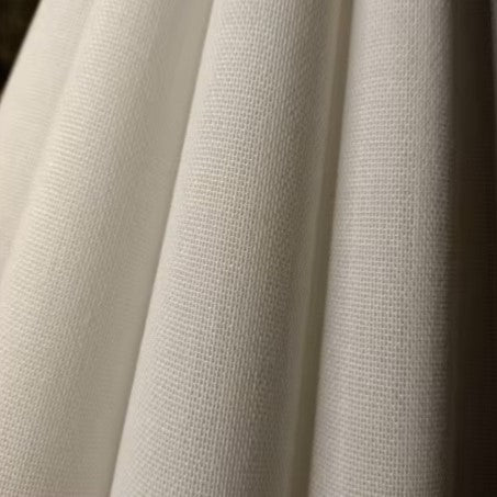 Cream pleated fabric lamp shades with fine vertical texture
