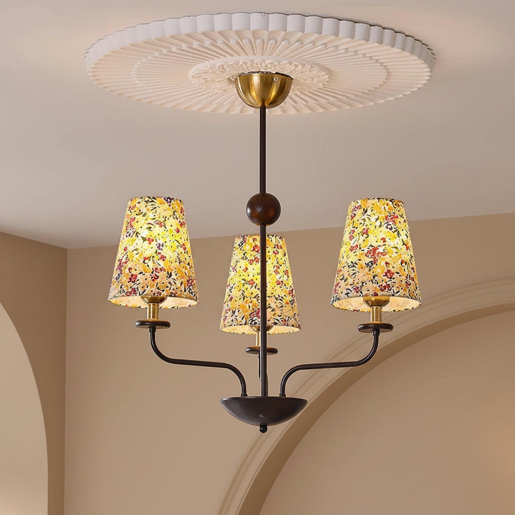 Multi-arm chandelier with floral conical shades and an illuminated ceiling canopy