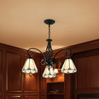 Black metal branch chandelier with 3 blue stained-glass bell shades and hanging chain