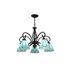 Black metal branch chandelier with 5 blue stained-glass bell shades, hanging