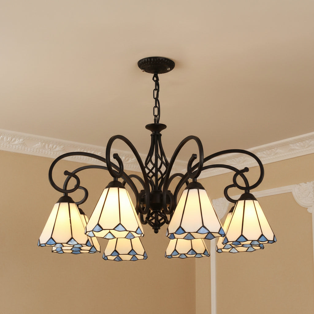 Black bell shade chandelier with blue stained-glass shades and ornate metal arms