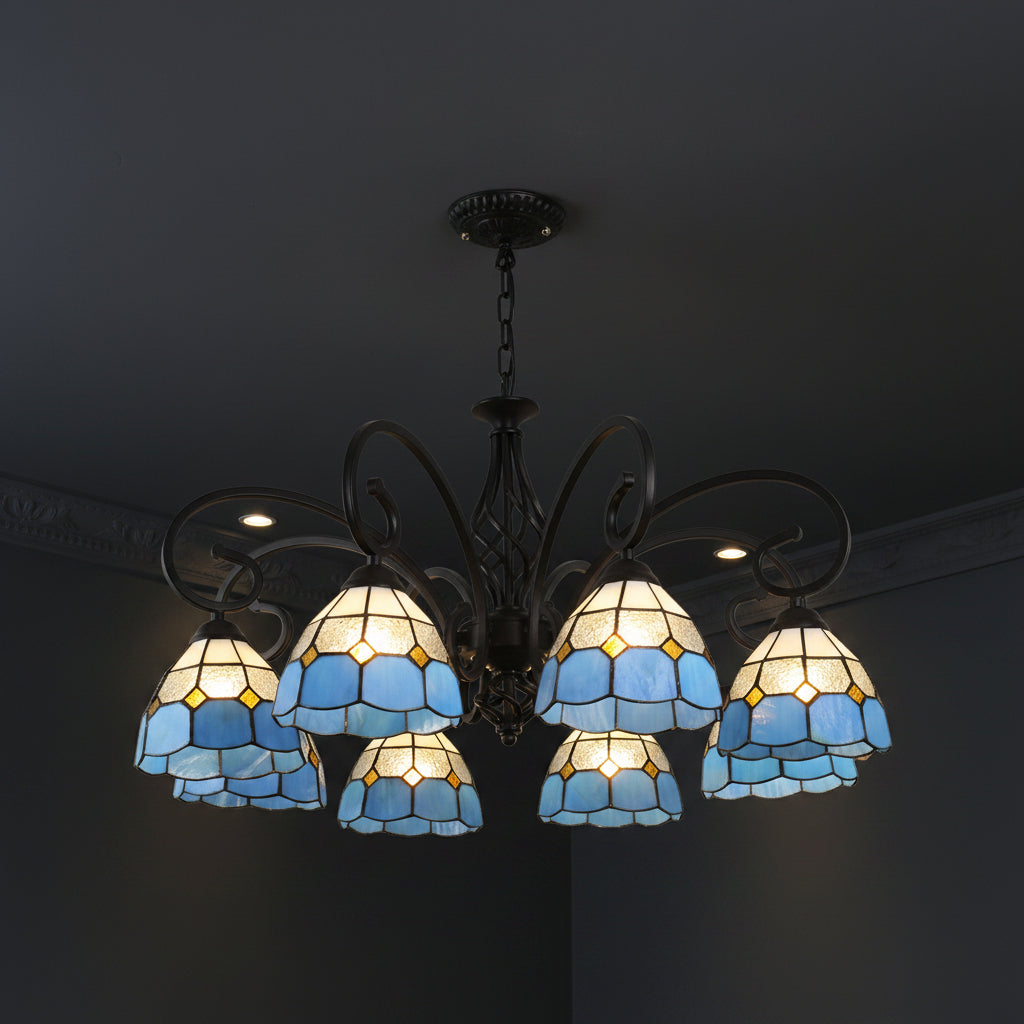 Black branch chandelier with multiple blue and amber stained-glass bell shades