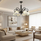 Black metal branch chandelier with 5 blue stained-glass bell shades and curved arms