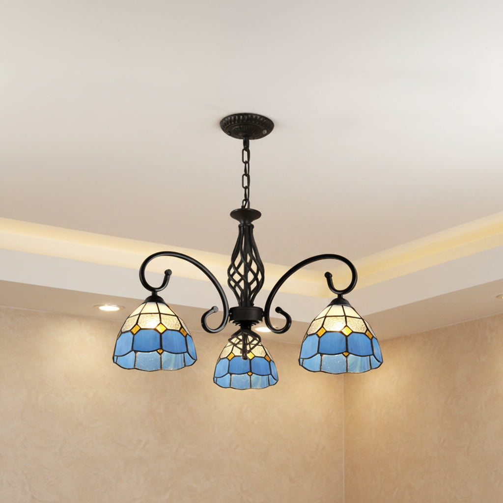 Black metal branch chandelier with 3 blue stained-glass bell shades and center harp