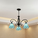 Black metal branch chandelier with 3 blue stained-glass bell shades on curved hooks