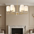 Multi-arm chandelier with frosted glass shades and gold-toned metal arms, upward facing